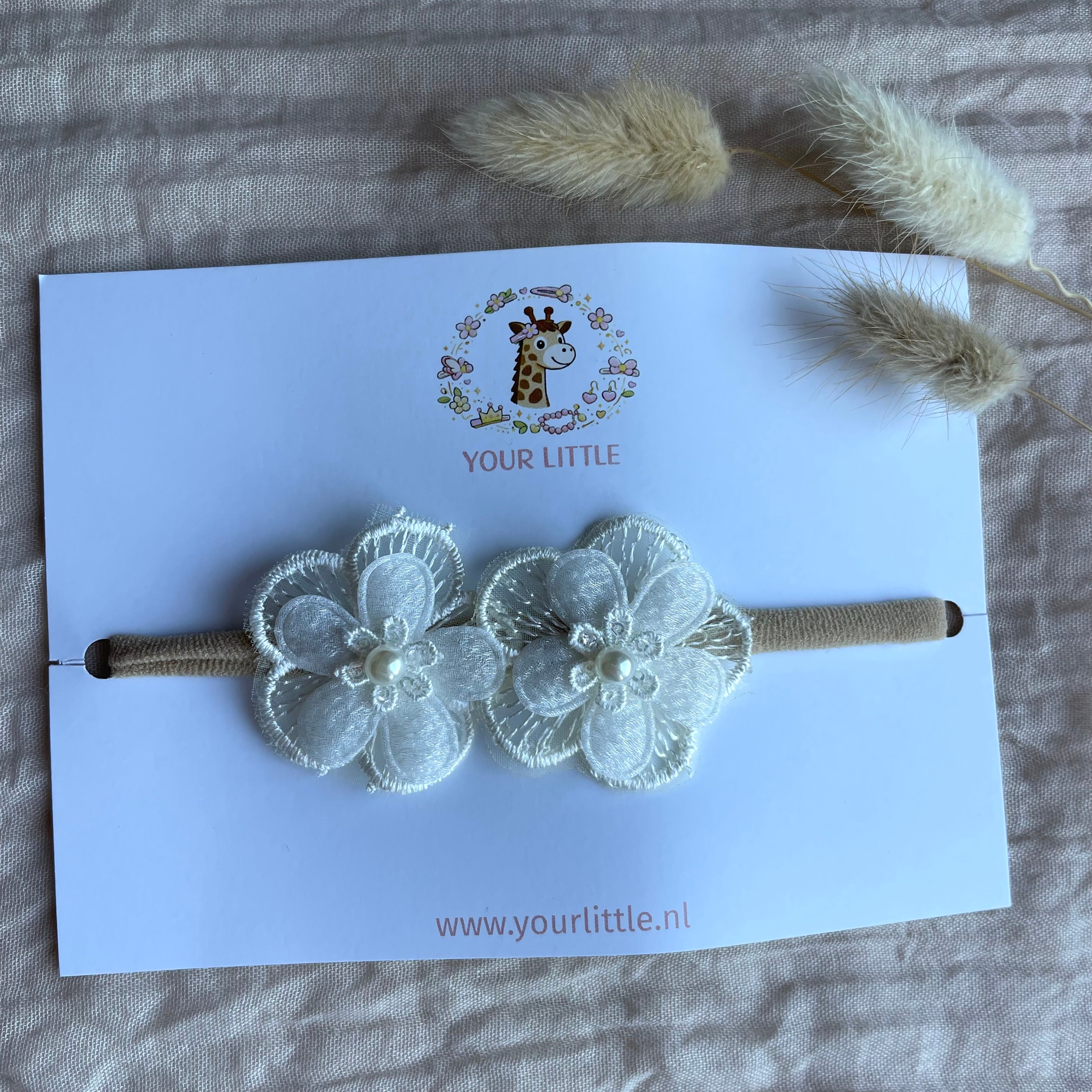 Haarbandje bloem crème