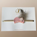 Baby haarbandje met roze pietenmuts, glitterrand en veertje
