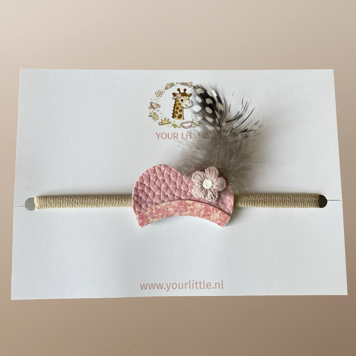 Baby haarbandje met roze pietenmuts, glitterrand en veertje